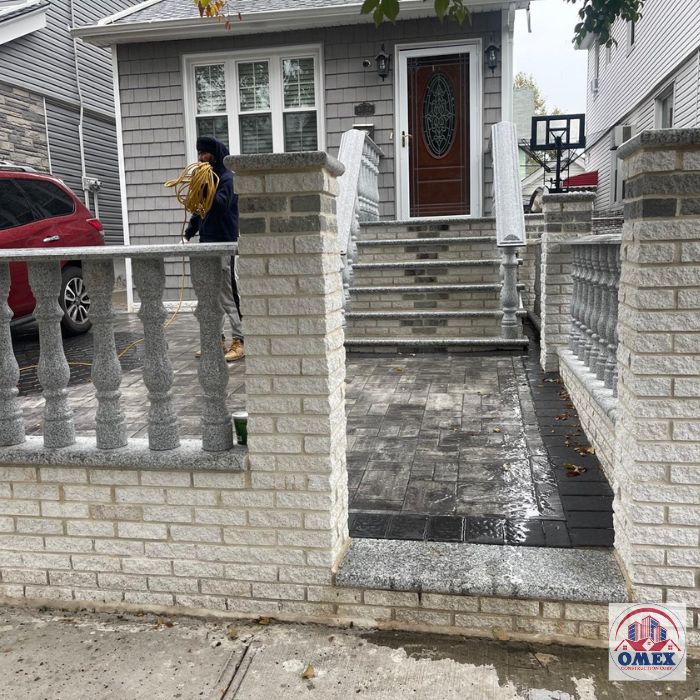 Wall and balustrade for a house project by Omex Construction Corp.