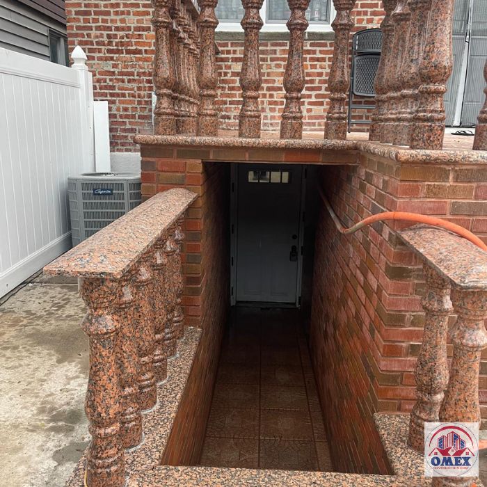 walkout basement entrance by Omex Construction Corp.